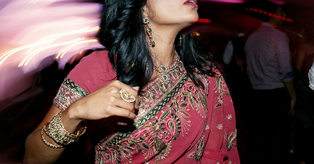 Indian Wedding Guest wearing Saree